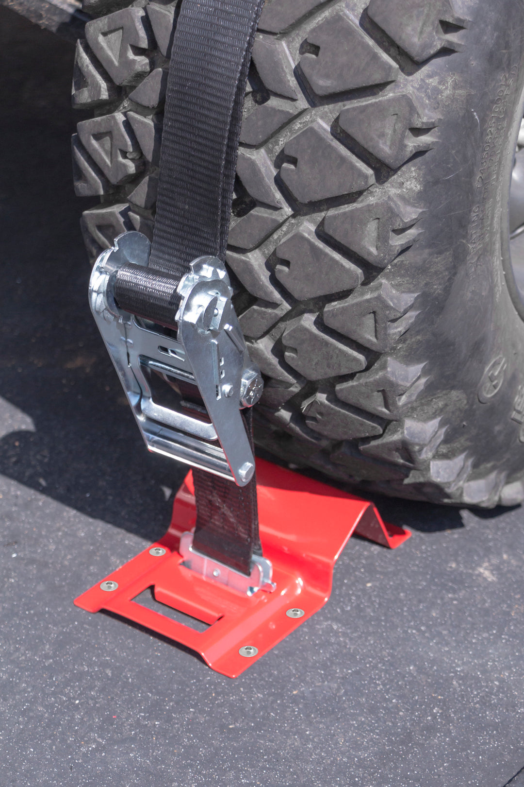 E-Track Chock 2 Pack in use with hardware for UTV and other light vehicles #color_red